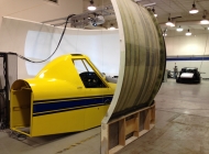 Here's the assembled Air Tractor simulator with the lights on. The computer rack is partially visible on the left and the Instructor Operator's Station (IOS) is behind that (not visible in this picture).