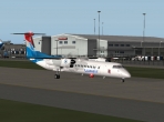 A taxiing De Havilland Dash 8
