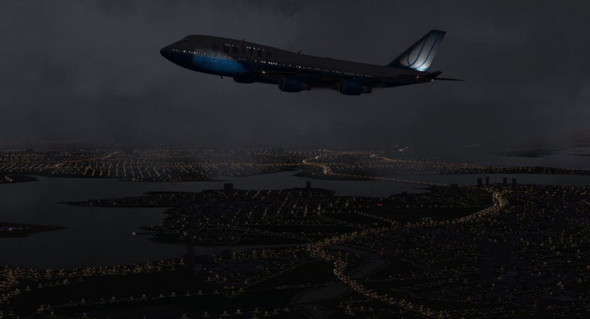 X-Plane 10's Boeing 747, flying over a city at night