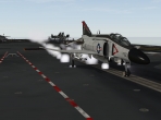 An F-4 Phantom II, taking off from a carrier