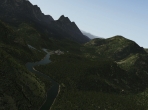 X-Plane 10's F-22 Raptor. soaring over a scenic landscape