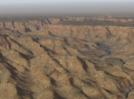 An X-Plane 10 canyon scenery, near KGCN