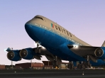 The Boeing 747 pulling its nose up in takeoff