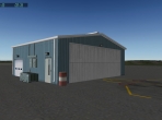 A small hangar, seen during the day