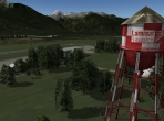A large water tower at a 'research and development' airport
